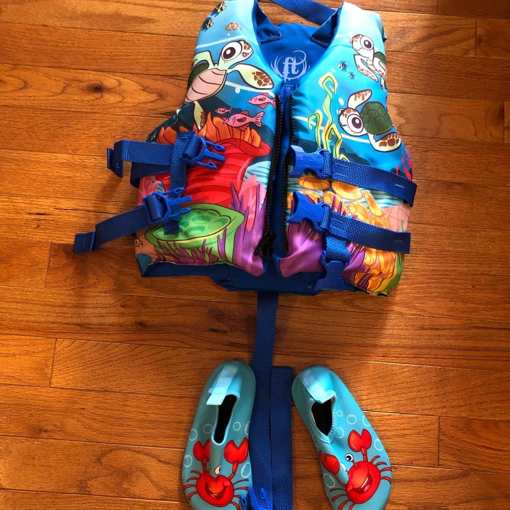Kids water safety vest and water shoes